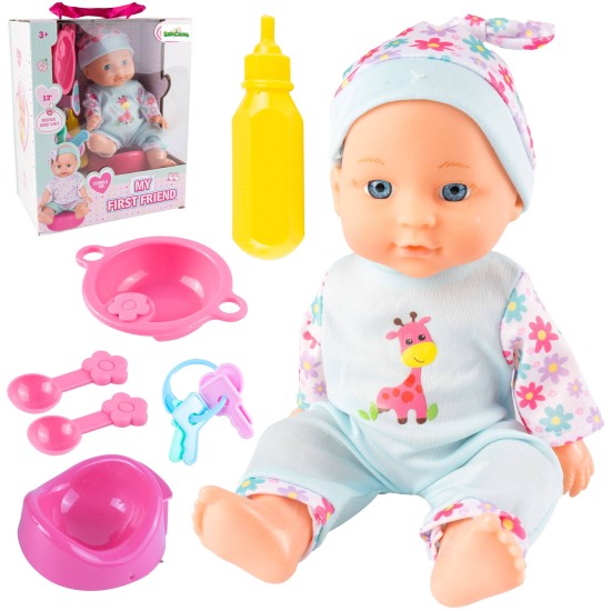 Nukk Deluxe 27 cm. riiete, söögiriistade ja muude tarvikutega